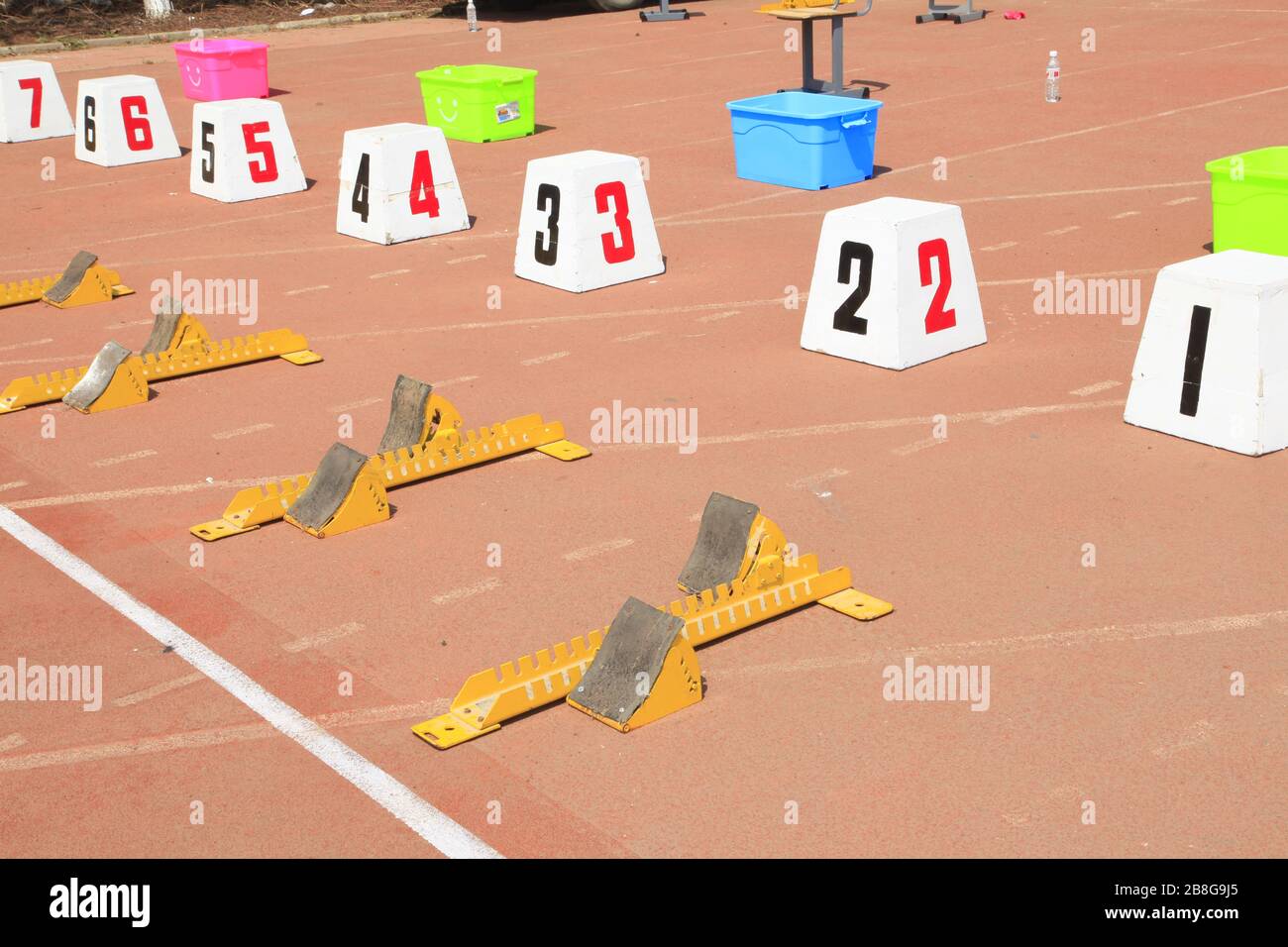 The starting blocks are on the track in the playground Stock Photo - Alamy