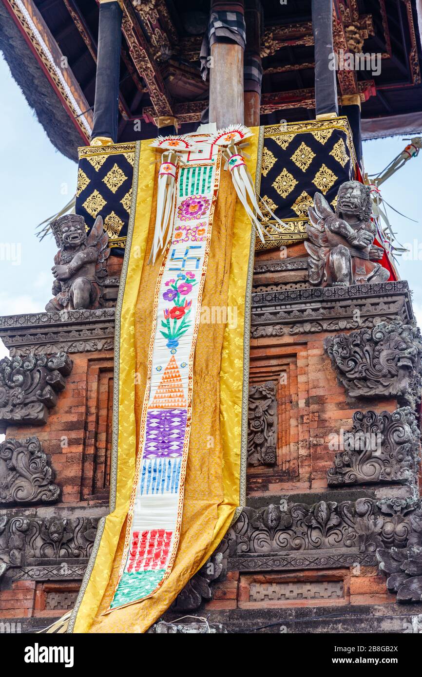 Bale kul kul in Balinese Hindu temple decorated with lamaks for Nyepi ...