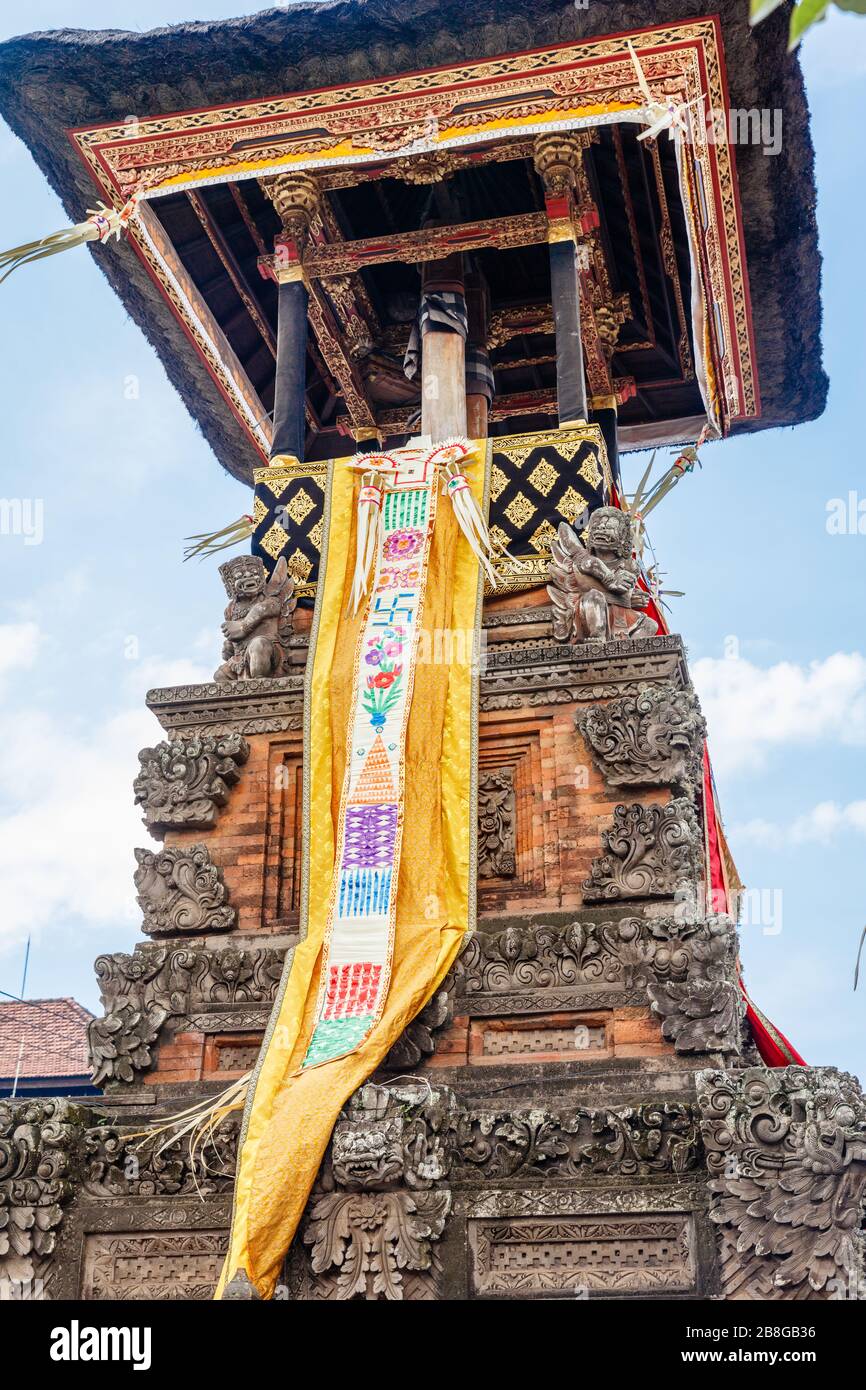 Bale kul kul in Balinese Hindu temple decorated with lamaks for Nyepi ...