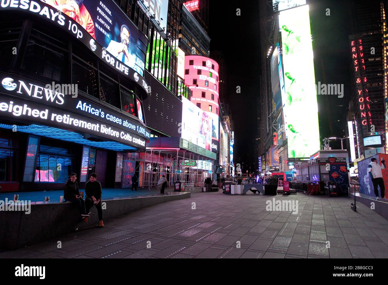 New York City, New York, United States. 21st Mar, 2020. Times Square in New York City on Saturday evening, March 21st, 2020 is largely devoid of people as New Yorker's heeded warning to stay at home in light of the coronavirus pandemic. Credit: Adam Stoltman/Alamy Live News Stock Photo