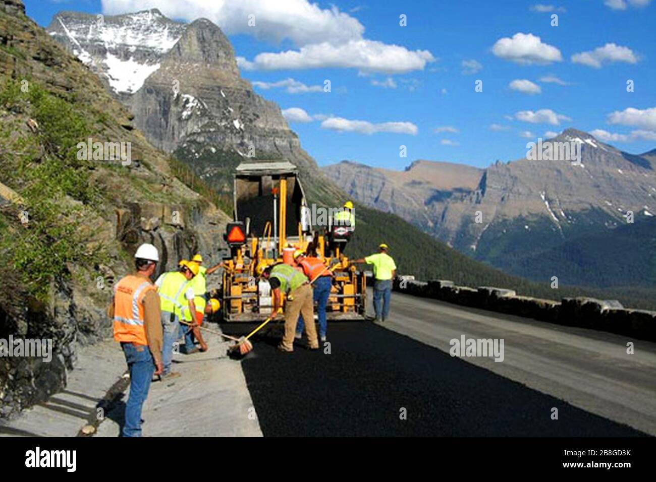 GoingtotheSun Road construction crew paving around milepost 33 Stock
