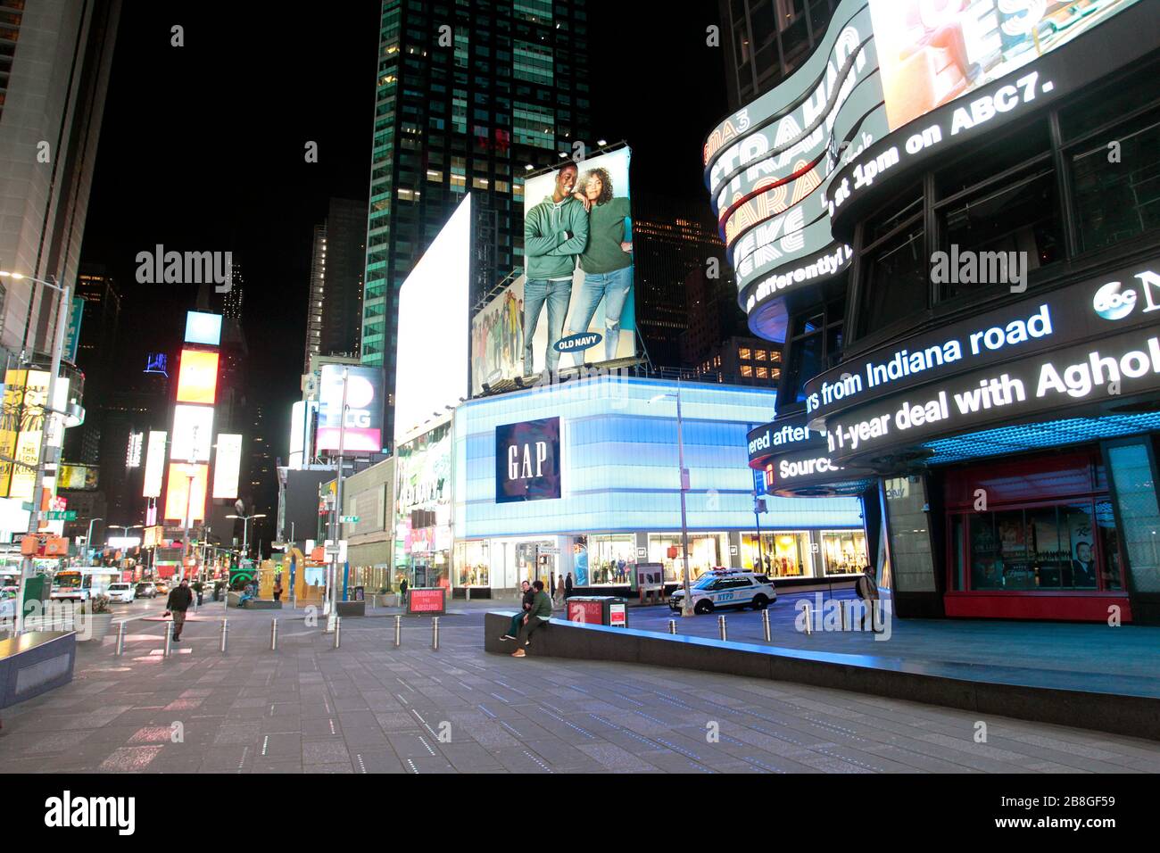 New York City, New York, United States. 21st Mar, 2020. Times Square in New York City on Saturday evening, March 21st, 2020 is largely devoid of people as New Yorker's heeded warning to stay at home in light of the coronavirus pandemic. Credit: Adam Stoltman/Alamy Live News Stock Photo