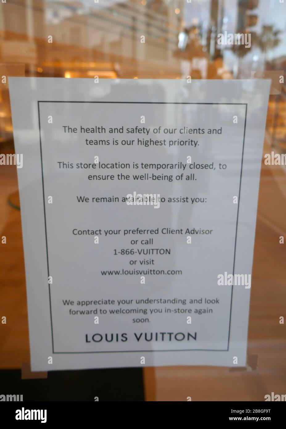 View of a closed Louis Vuitton store on the avenue Montaigne after