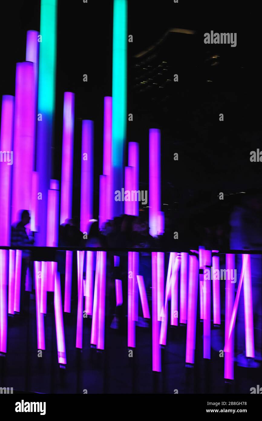 Purple, magenta, pink poles, Samsung installation at VIVID Sydney, the popular annual event of light sculptures and creative illuminated art Stock Photo