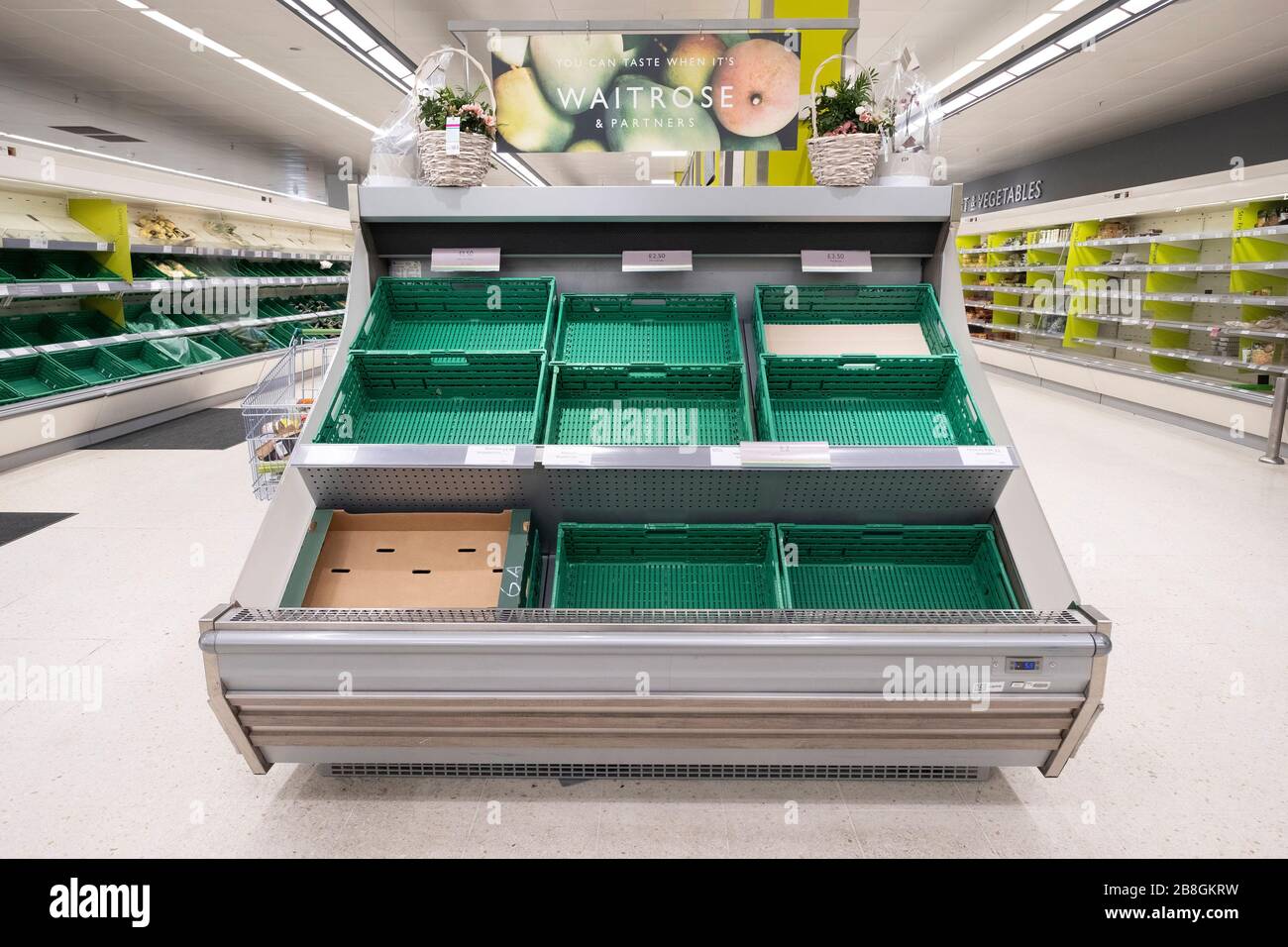 Beijing, China. 22nd Mar, 2020. Photo taken on March 21, 2020 shows empty shelves of a supermarket in London, Britain. Credit: Xinhua/Alamy Live News Stock Photo