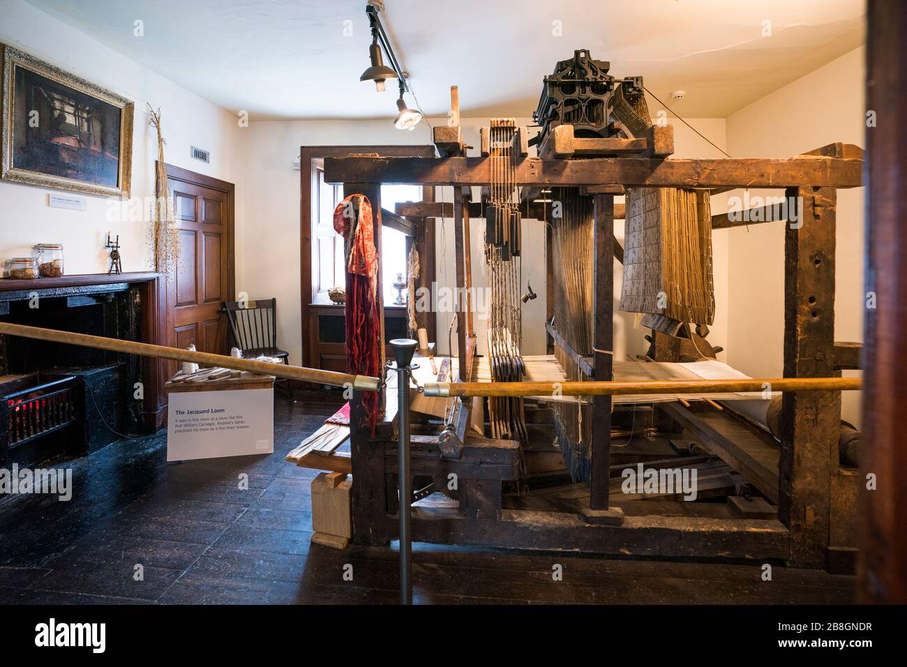Family loom inside Andrew Carnegie's birthplace home, now a tourist