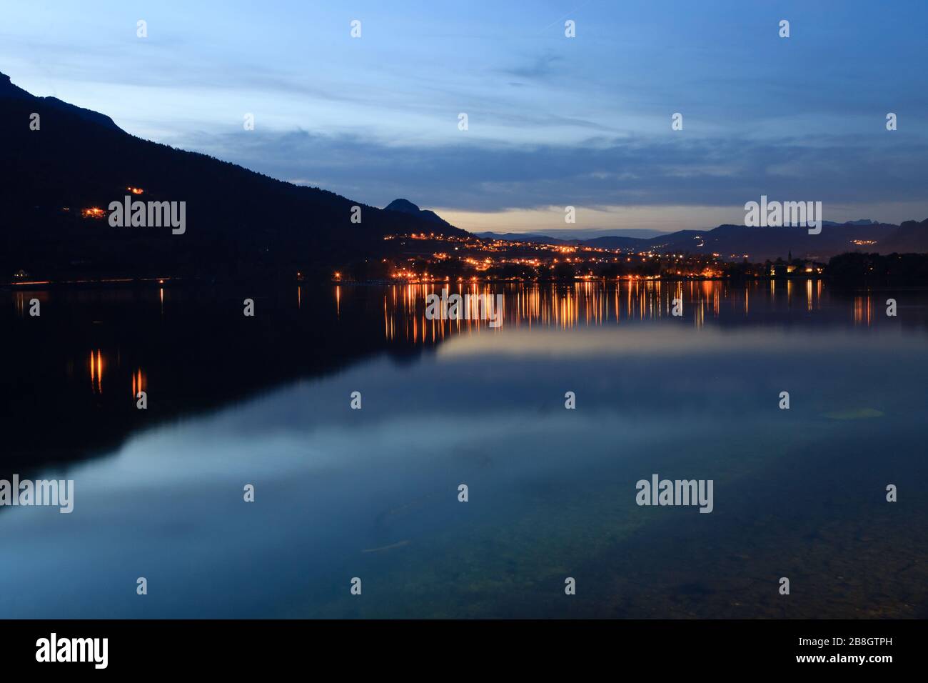 Reflections on lake, Caldonazzo lake, Italy. Italian landscape. Stock Photo