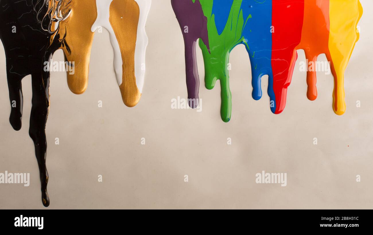Color palette dripping on gray background, creative frame Stock Photo