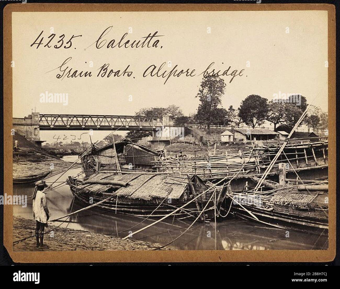 Grain boats near Alipore bridge in Calcutta by Francis Frith. Stock Photo