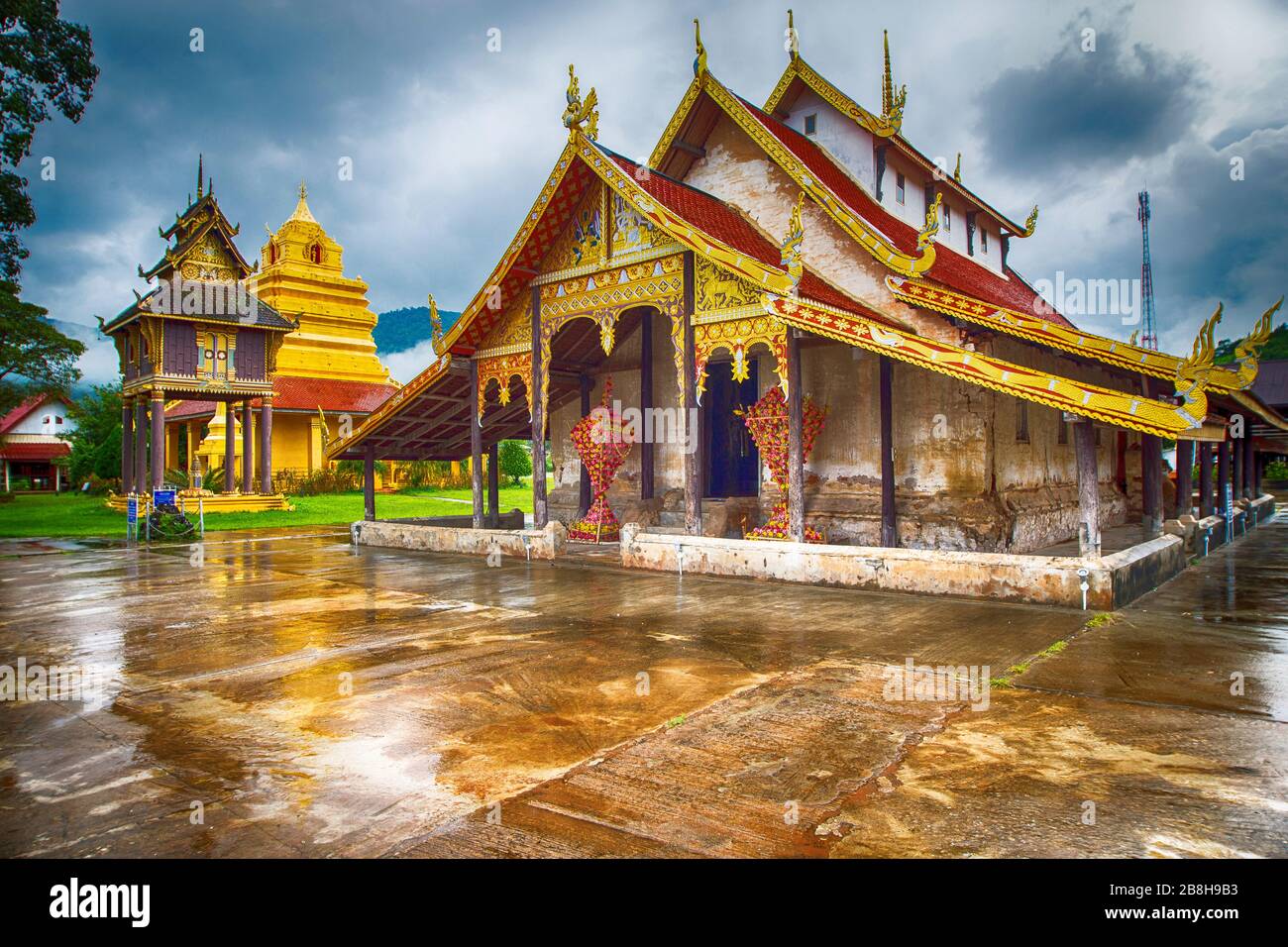 The Tripitaka Buddha Temple and the Chapel within Wat Si Pho Chai at Na Haeo District Stock Photo