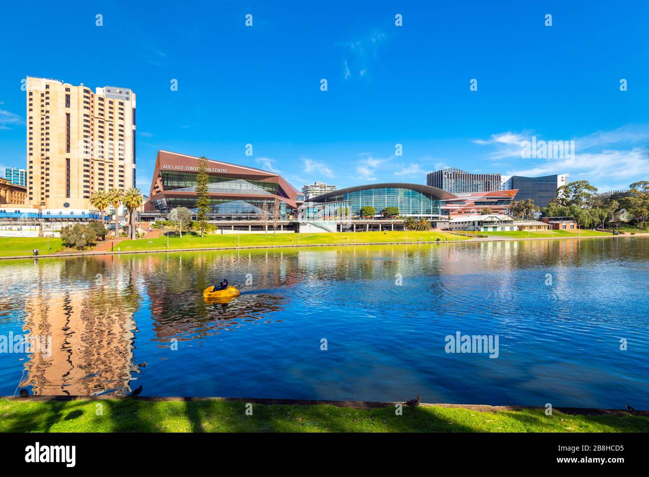 Adelaide, Australia - August 4, 2019: Adelaide City Business  Centre skyline viewed across Riverbank on a day Stock Photo