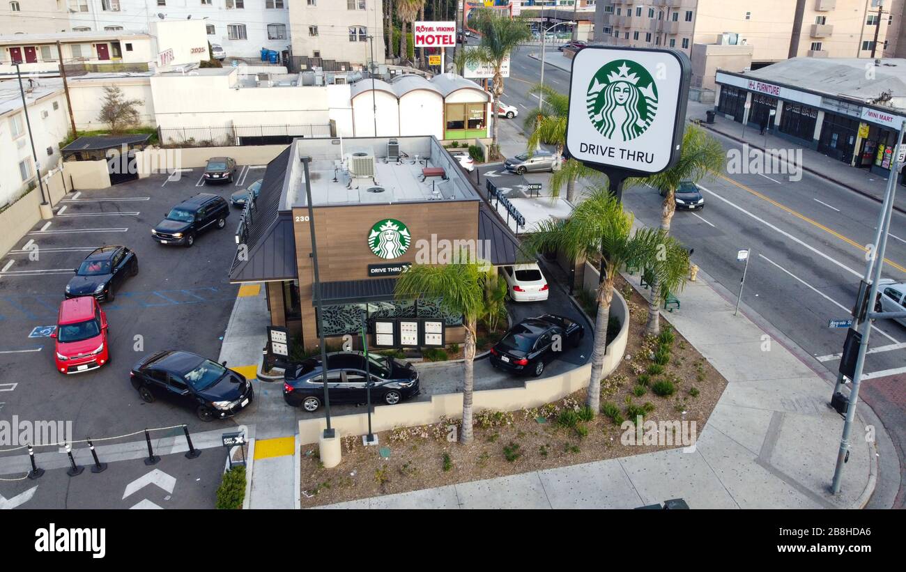 General overall aerial view of a line at a drive-thru only Starbucks located at 230 S Alvarado St, Saturday, March 21, 2020, in Los Angeles, Calif. In an effort to stop the spread of the novel coronavirus (COVID-19), Starbucks announced Friday that it will shut down the cafe portion of locations, making them drive-thru only for at least a month. (Photo by IOS/Espa-Images) Stock Photo