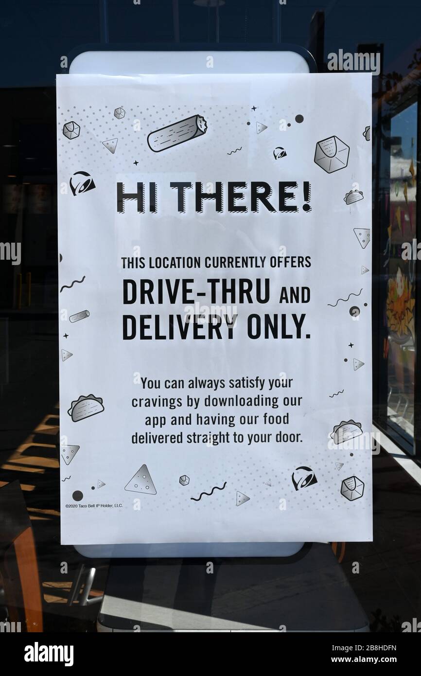 General overall view of Taco Bell restaurant open for drivethru and