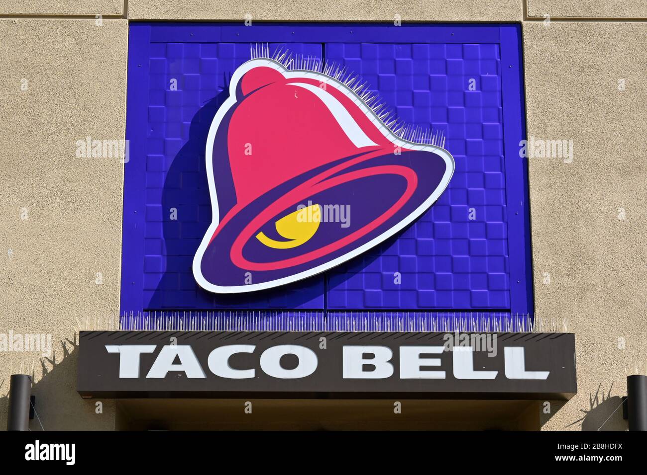 General overall view of Taco Bell restaurant open for drivethru and