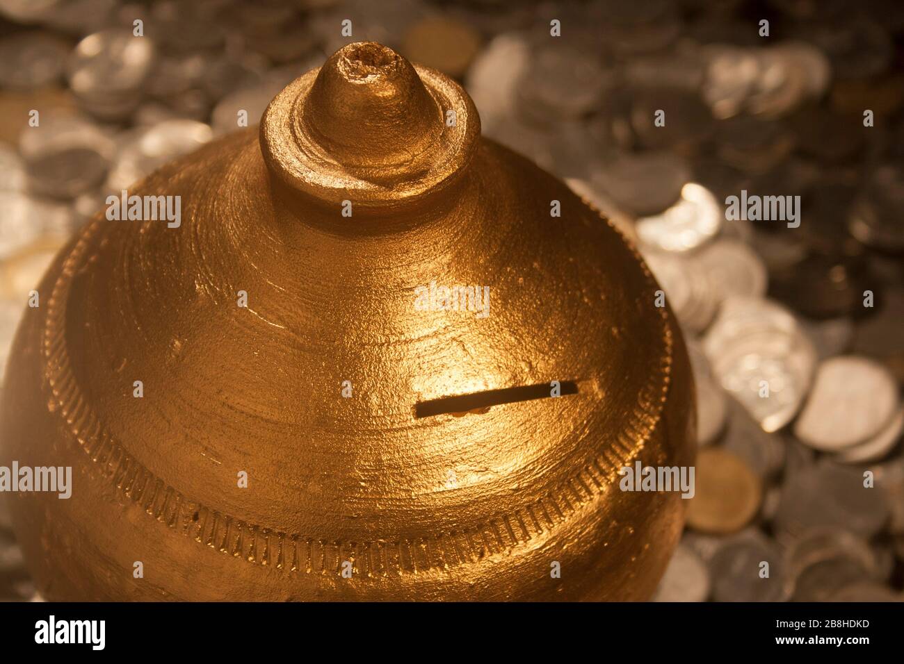 Gullak is the traditional name of a coin container or Indian piggy bank, usually used by children in rural India,coin Stock Photo