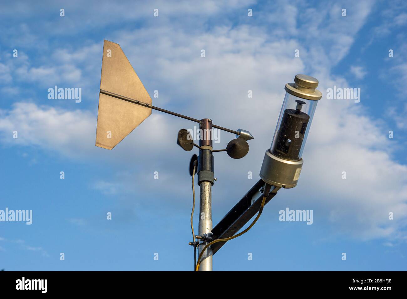 Wind speed measuring device The background is a sky with white fluffy