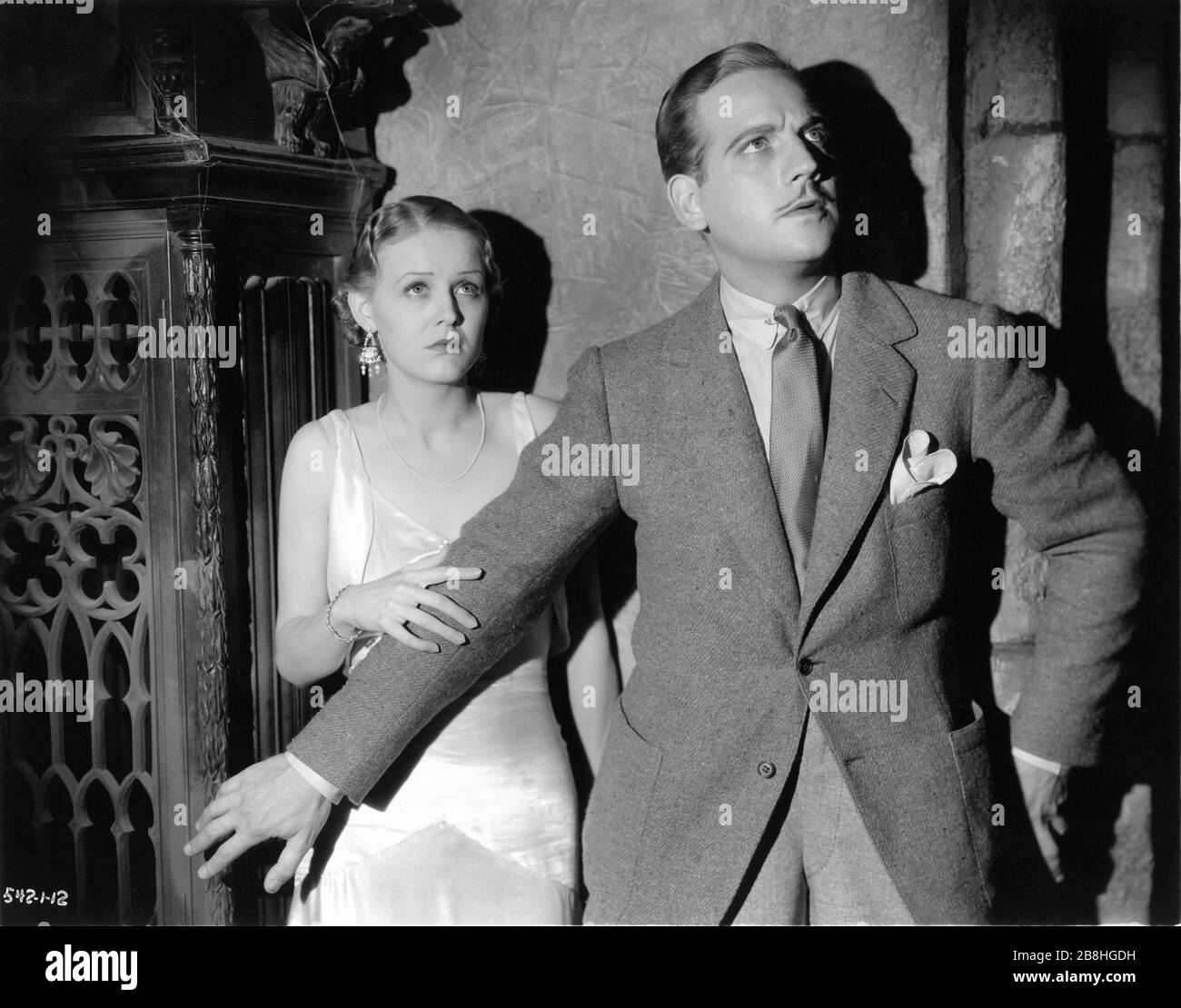 GLORIA STUART and MELVYN DOUGLAS in THE OLD DARK HOUSE 1932 director JAMES WHALE novel J. B. Priestley screenplay Benn W. Levy Universal Pictures Stock Photo