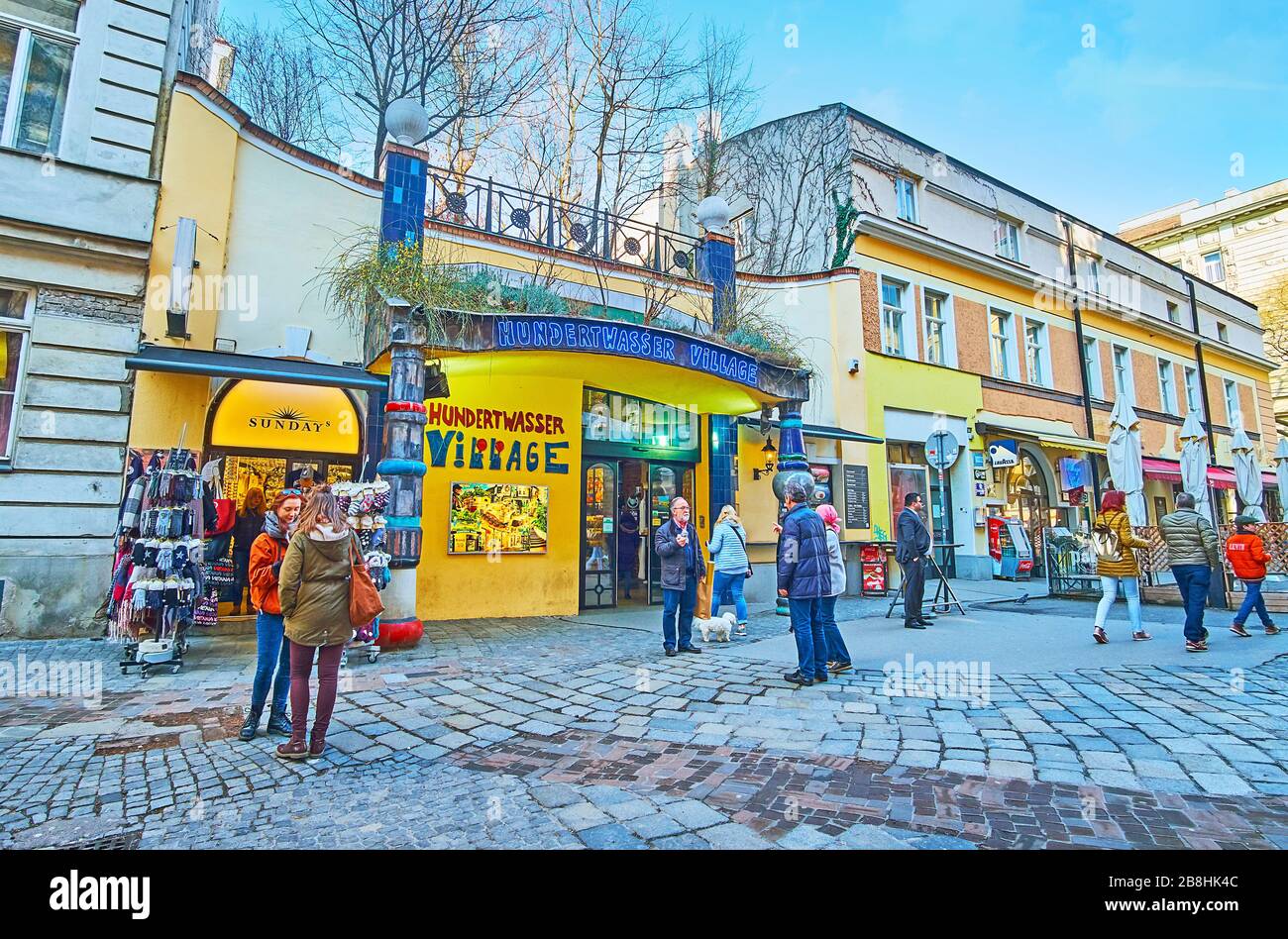 VIENNA, AUSTRIA - FEBRUARY 19, 2019: The entrance to Hundertwasser village handicraft market, popular among the tourists, on February 19 in Vienna Stock Photo