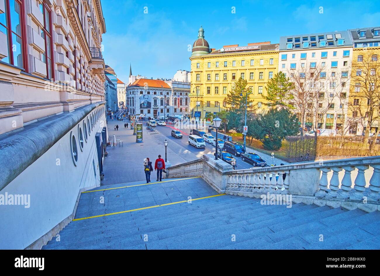 VIENNA, AUSTRIA - FEBRUARY 19, 2019: The Augustinerstrasse street with historical edifices, mansions, palaces, museums and long staircase of Albertina Stock Photo