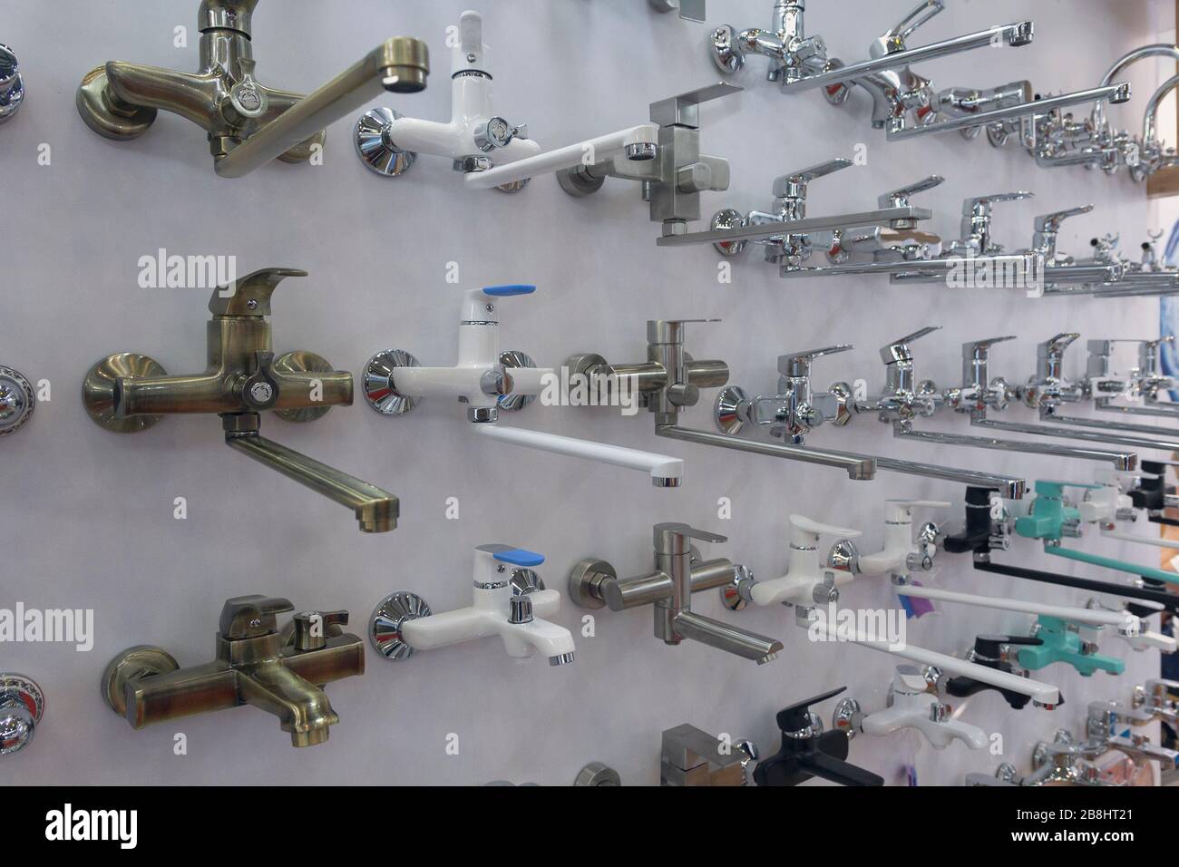 Range of faucets at the hardware store. Promyshlennest Stock Photo