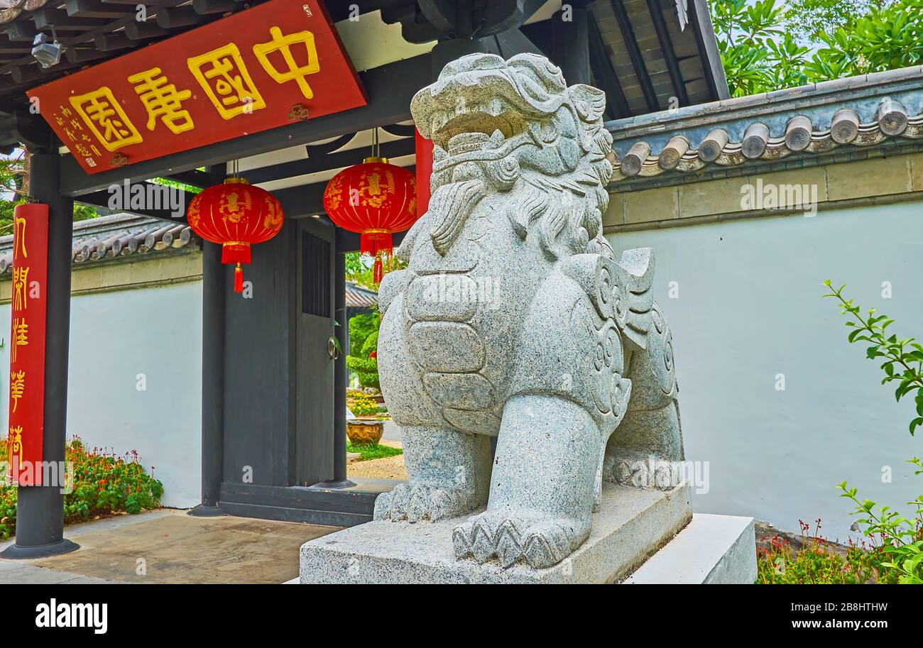 CHIANG MAI, THAILAND - MAY 7, 2019: The statue of Pixiu creature with lion body and dragon wings at the gate of China garden in Rajapruek park, on May Stock Photo