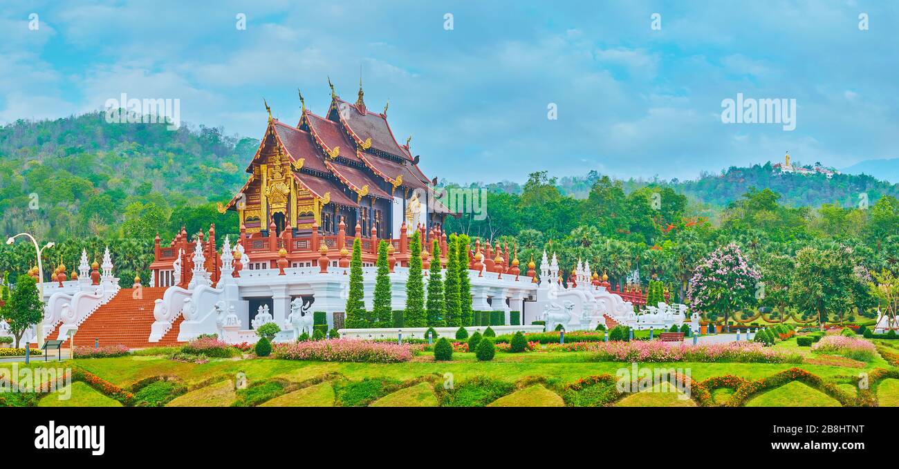 Panorama of stunning Royal pavilion, located amid the flower beds and topiary trees of Rajapruek park, Chiang Mai, Thailand Stock Photo