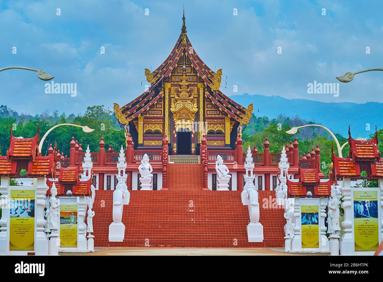 CHIANG MAI, THAILAND - MAY 7, 2019: Lanna style building of Royal pavilion of Rajapruek park with pyathat roof, gilt carvings, ornate bargeboards, rel Stock Photo