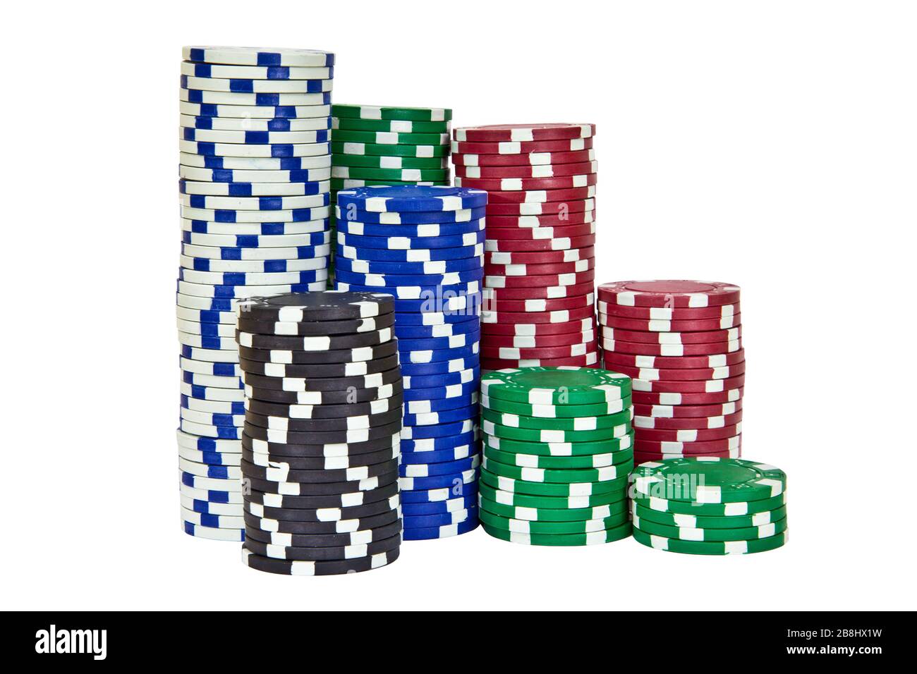 Stacks of poker chips including red, black, white, green and blue on a