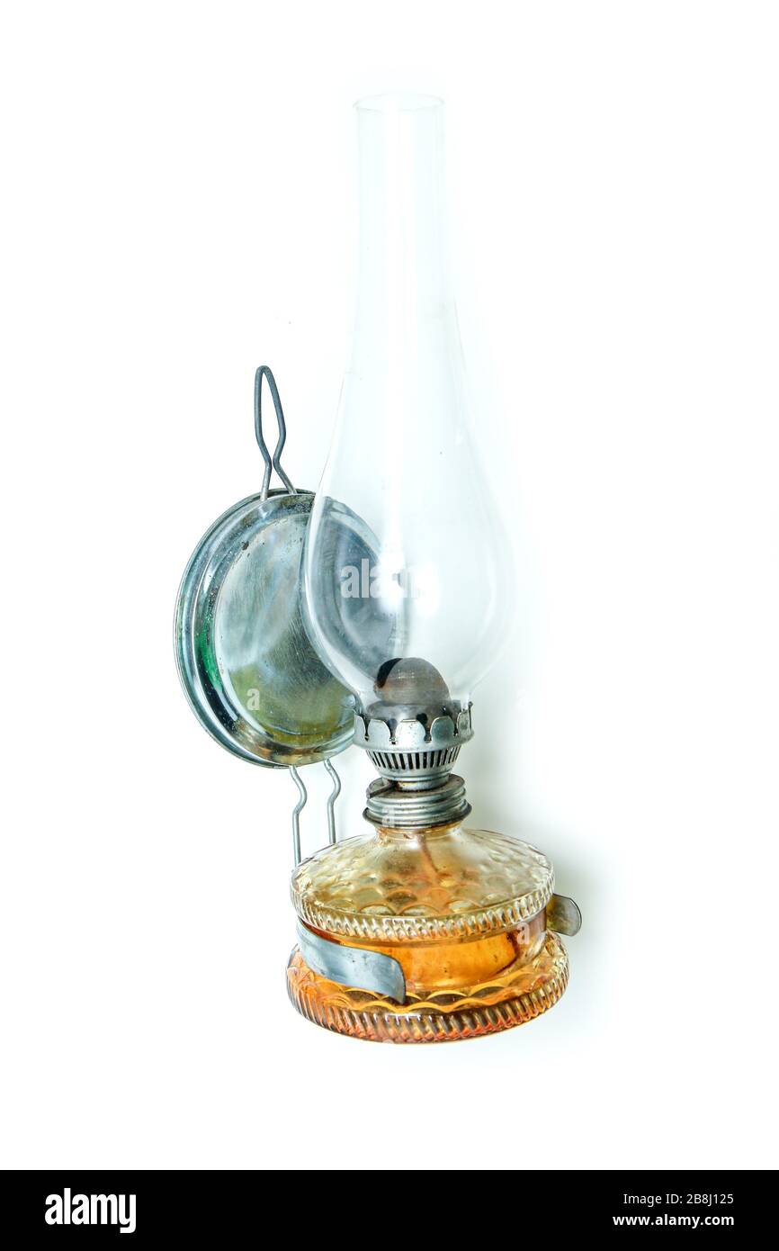 The traditional old retro or vintage petroleum lamp isolated in a white  background Stock Photo - Alamy