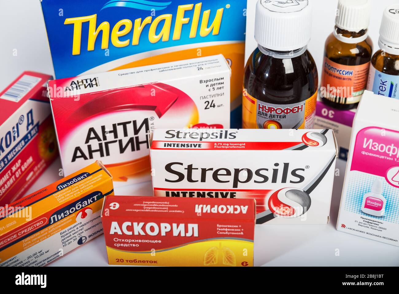 RUSSIA - MARCH, 2020: Home medicine kit. A set of over-the-counter medicines for treating colds in children and adults. Illustrative editorial Stock Photo
