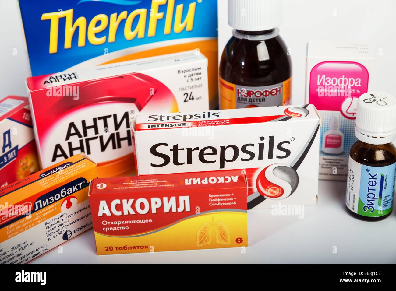 RUSSIA - MARCH, 2020: set of over-the-counter medicines for treatment of influenza and common cold in children and adults. Illustrative editorial Stock Photo