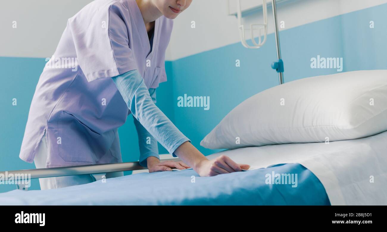 Woman changing sheets hires stock photography and images Alamy