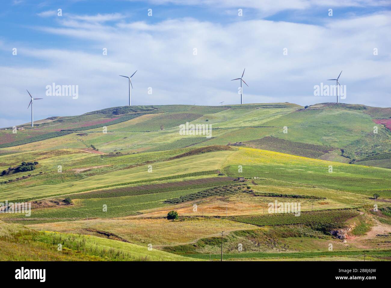 Wind turbines on a fields in Province of Trapani on Sicily Island in Italy Stock Photo