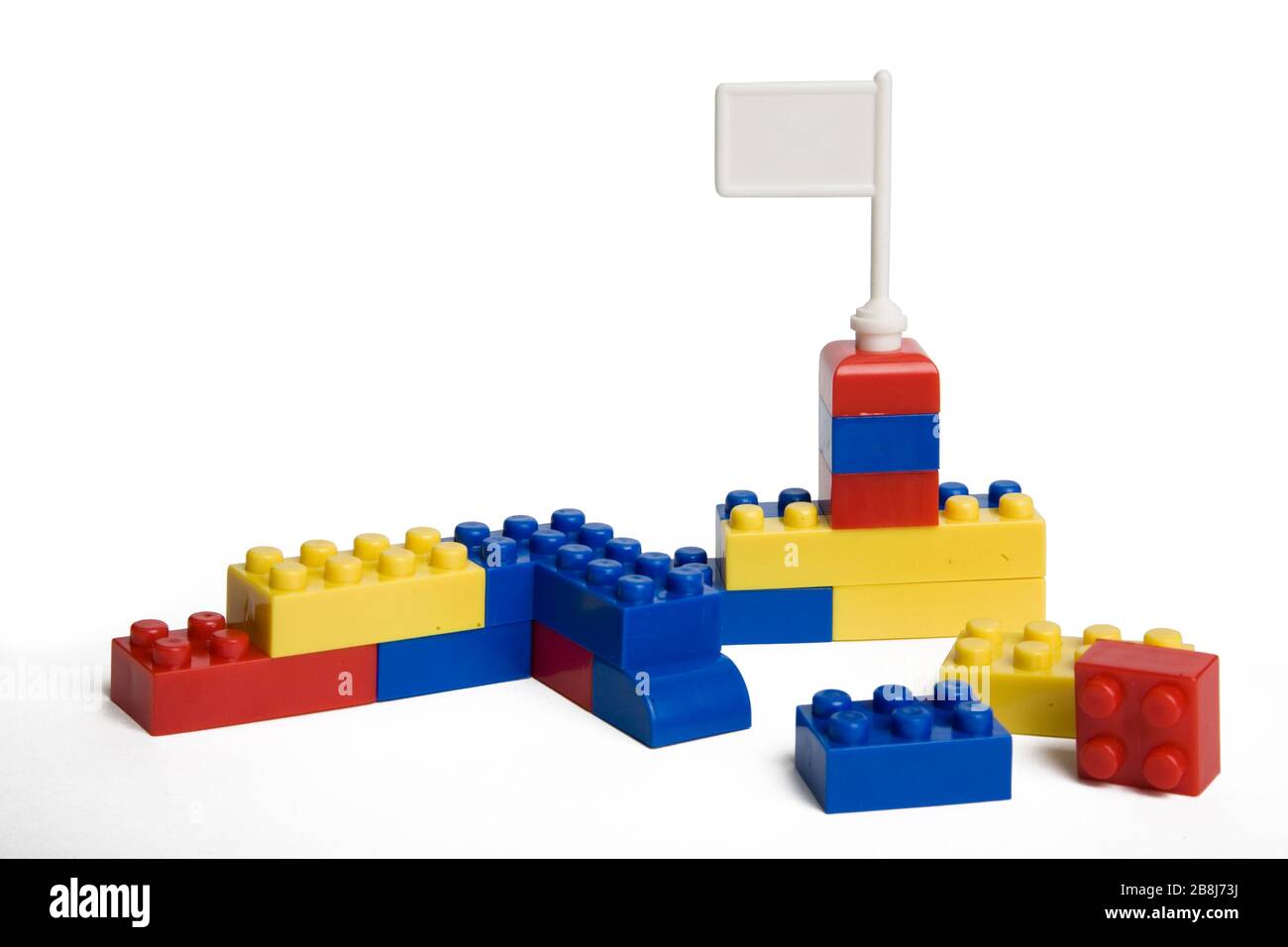 Plastic toy blocks on white background Stock Photo - Alamy