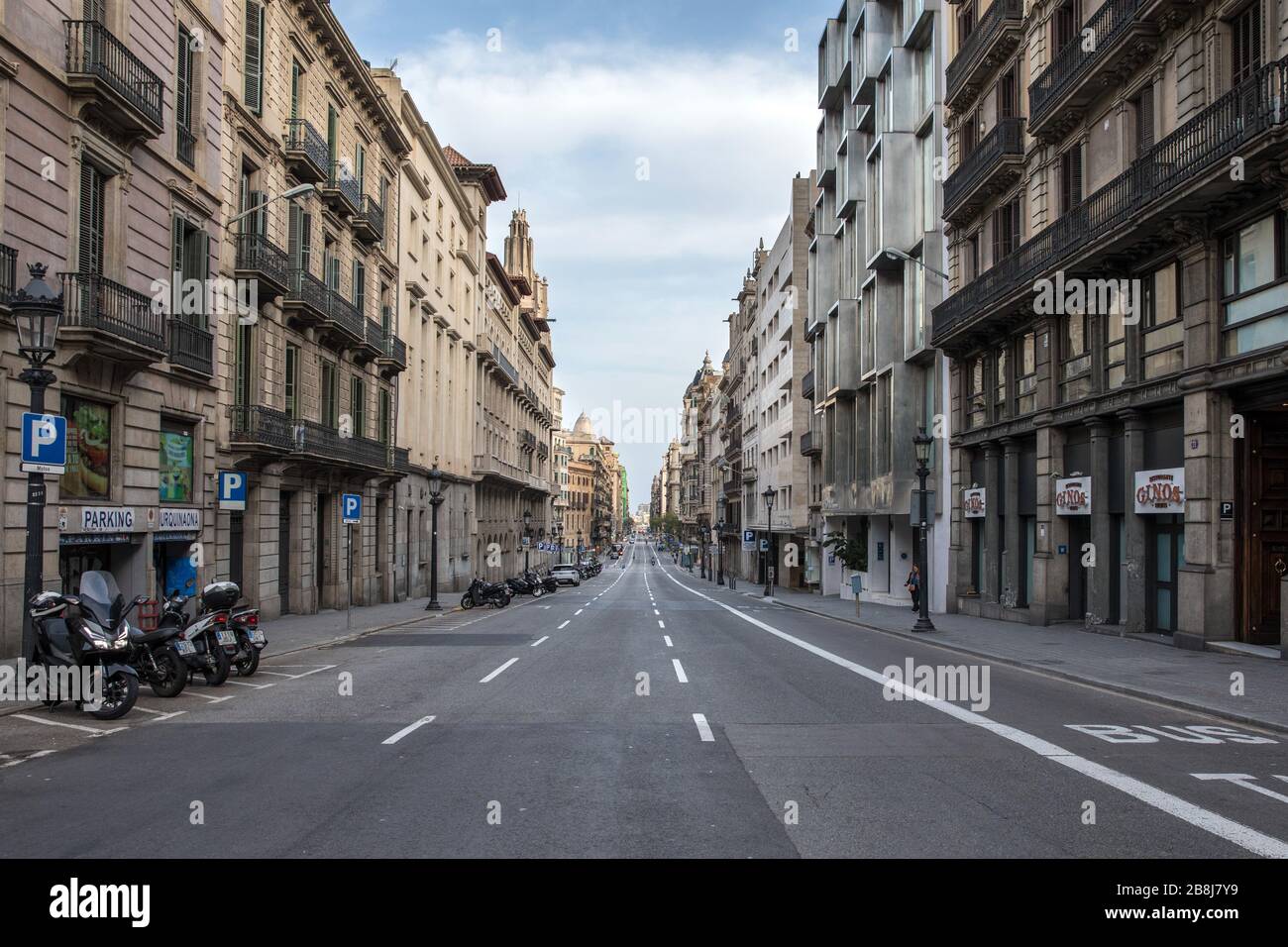 Via Laietana road, a very important road in the city center of Barcelona, is empty of people and traffic on the 5th day of confinement decreed due to Stock Photo