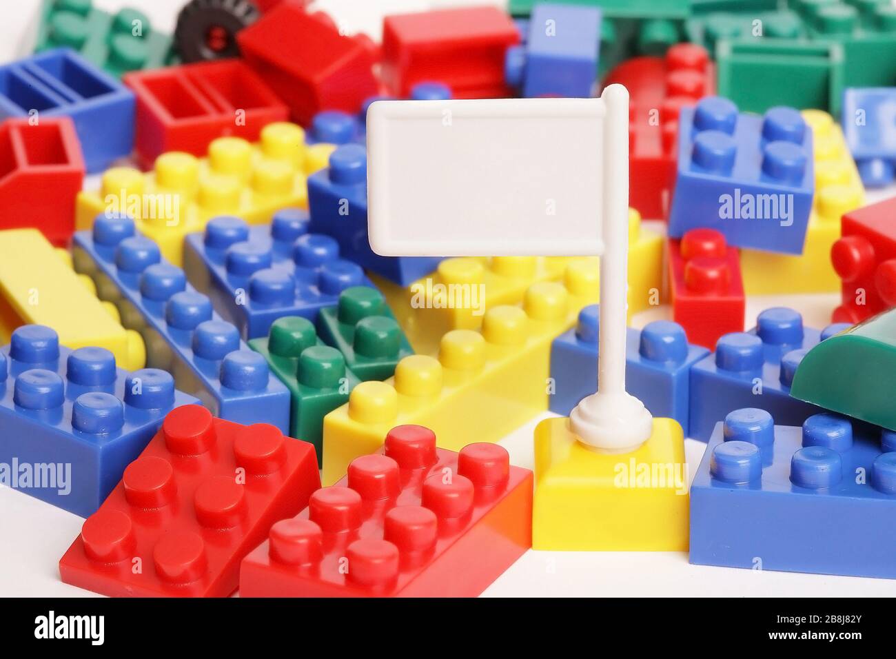 Plastic toy blocks isolated on the white background Stock Photo - Alamy