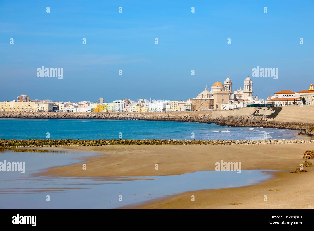 Cityscape of Cadiz with Cathedral and beach Stock Photo