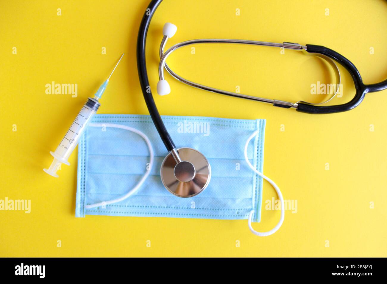 Download Medical Stethoscope Stethoscope And Medical Mask On A Yellow Background Stock Photo Alamy PSD Mockup Templates