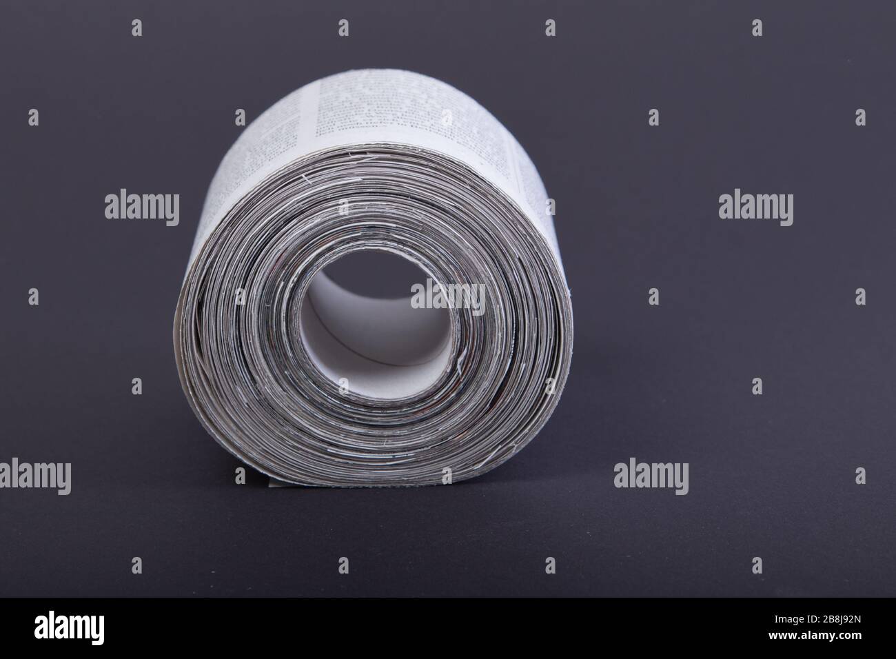 toilet paper made out of newspapers, alternative toilet paper, isolated