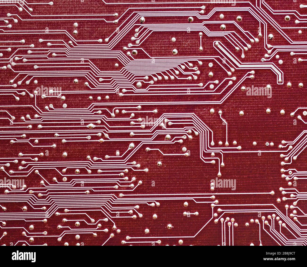 Close up of computer circuit board in red Stock Photo - Alamy