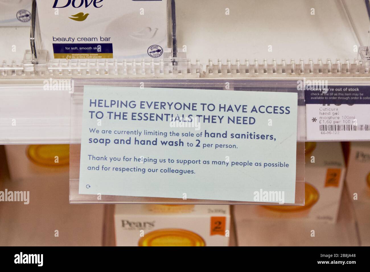 A sign at Boots UK limiting soap, hand wash and hand sanitisers to 2 per customer due to stockpiling during Coronavirus Stock Photo