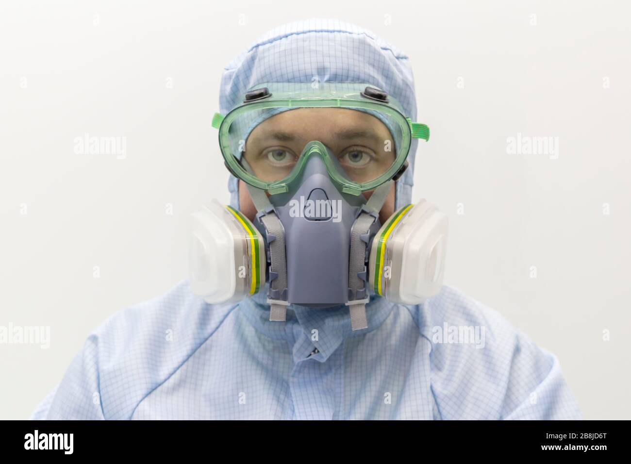 Man with mask gas in the lab. Chemical and virus protection. Stock Photo