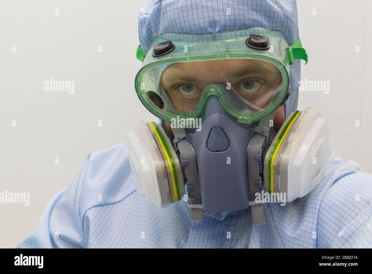 Man with mask gas in the lab. Coronavirus 2019 - nCoV Stock Photo