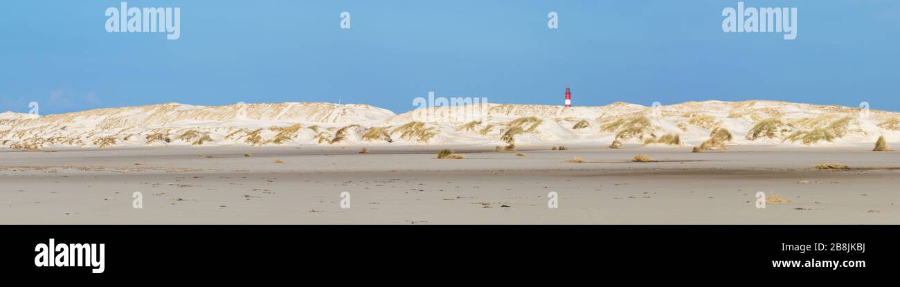 Ultra wide panoramic view of dunes with lighthouse of German North Sea ...
