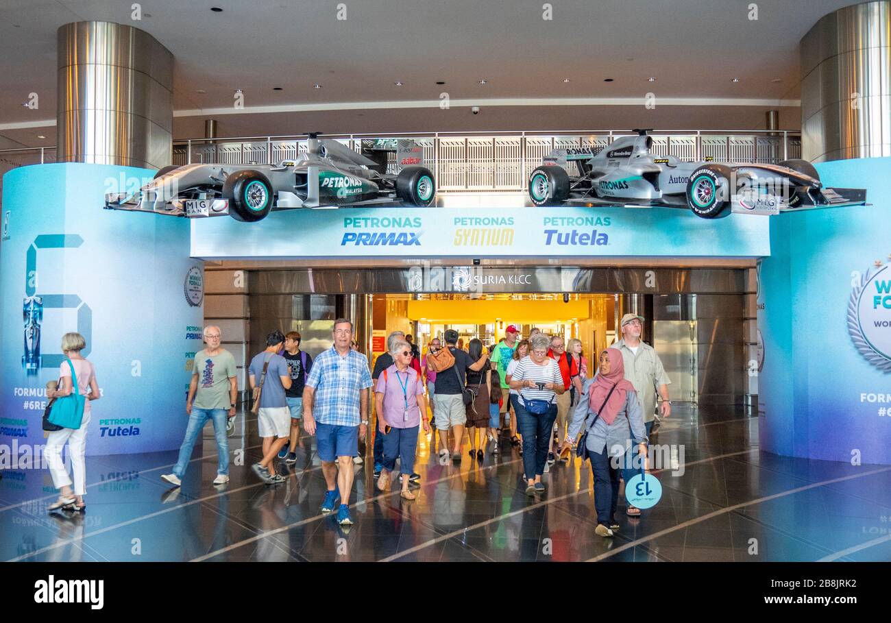 Mercedes-AMG Petronas Formula One Team cars on display in lobby of Petronas Towers celebrating 6th consecutive championship win Kuala Lumpur Malaysia. Stock Photo