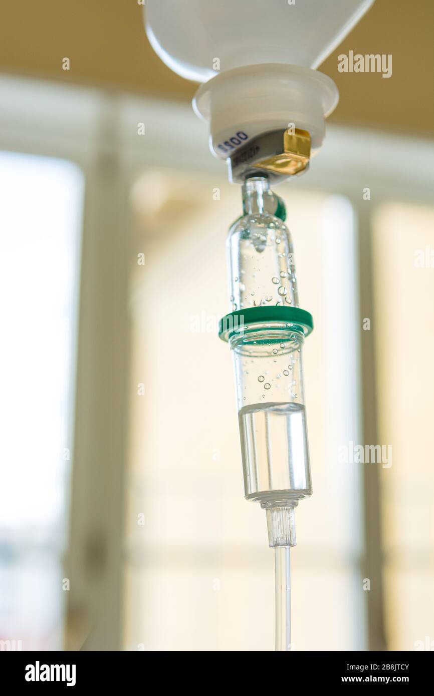 Dripping of IV solution, Intravenous therapy for patient in hospital