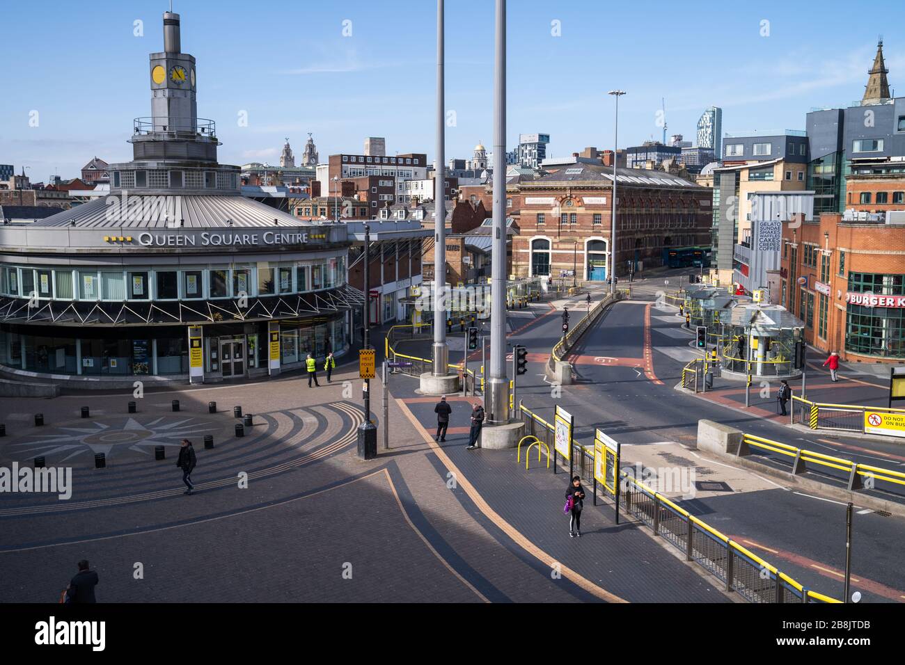 Liverpool, UK. March 22, 2020. Liverpool city centre in the north-west of England almost completely deserted after the Government in the United Kingdom ordered the shut down of all pubs and restaurants due to the worldwide Coronavirus pandemic. Some local services such as public transport has been scaled back in the city due to a reduction in passenger numbers. Credit: Christopher Middleton/Alamy Live News Stock Photo