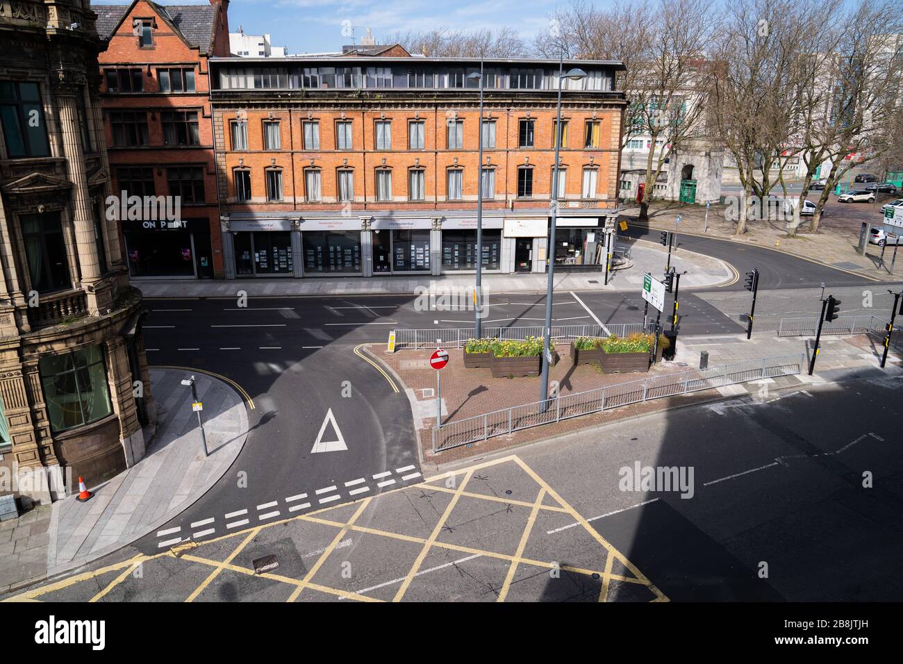 Liverpool, UK. March 22, 2020. Liverpool city centre in the north-west of England almost completely deserted after the Government in the United Kingdom ordered the shut down of all pubs and restaurants due to the worldwide Coronavirus pandemic. Some local services such as public transport has been scaled back in the city due to a reduction in passenger numbers. Credit: Christopher Middleton/Alamy Live News Stock Photo