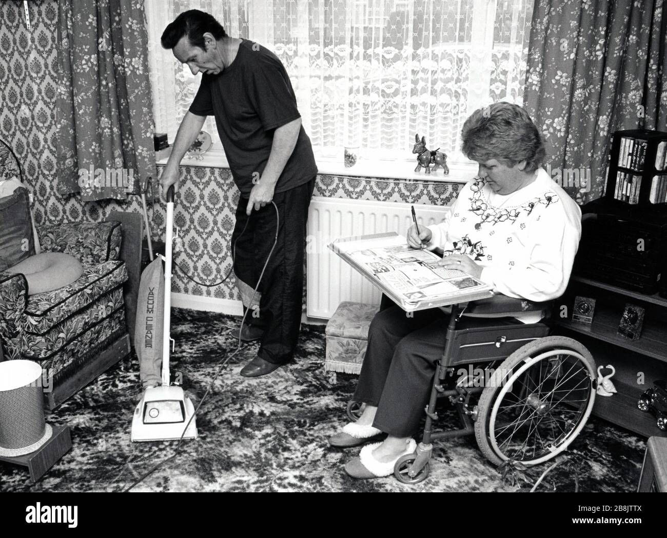 Carer & disabled woman UK 1991 Stock Photo