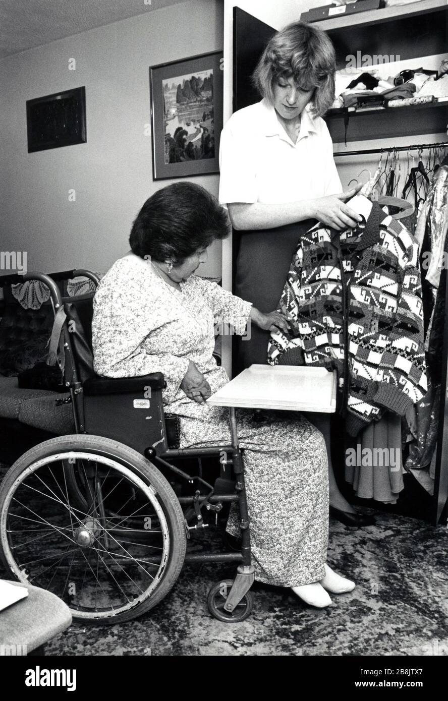 Carer & elderly woman UK 1992 Stock Photo